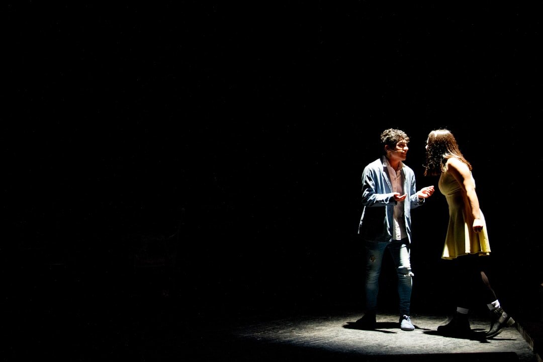 Theatre actors rehearsing on stage